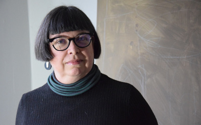 Headshot photograph of Dr Mimi Tatlow-Golden