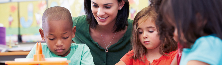 Social worker with children at play