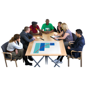 A group of people sat together at a table