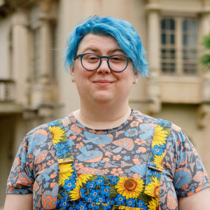 Photo of Eliph Hadert stood in front of Brighton Pavilion