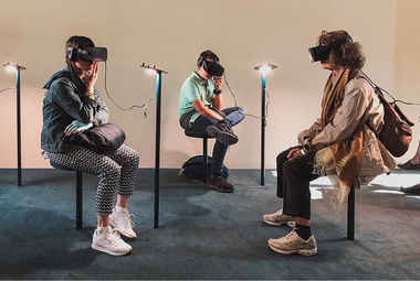 Group of young people using virtual reality devices